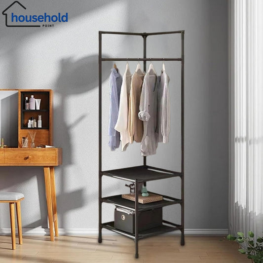 Clothing rack with clothes in a room with a desk and cabinet.